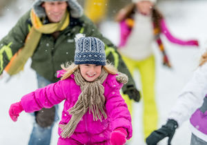 Happy child ice skates