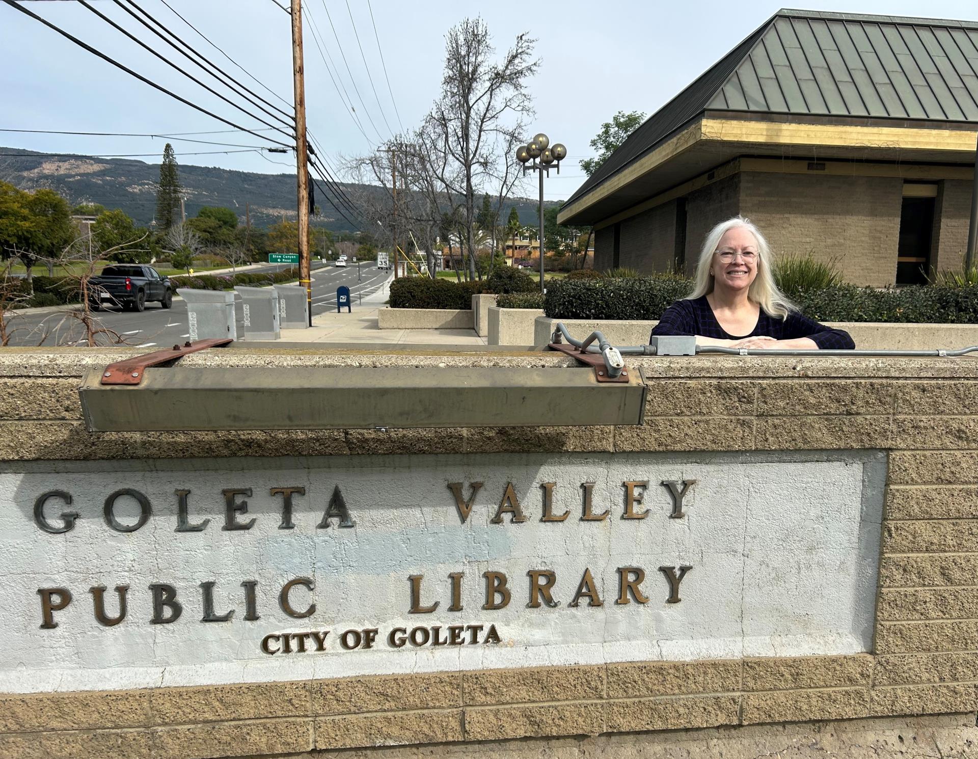 Allison Gray behind Goleta Valley Library Sign